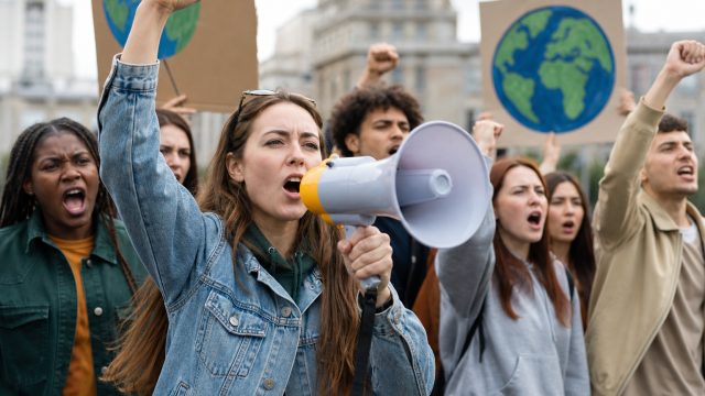 Activists Rally for Environmental Change in Urgent Protest